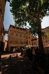 Panorama view of Avignon Place du Cloître-Saint-Pierre with Basilique Saint-Pierre d'Avignon featuring Gothic architecture