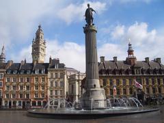 Column of the Goddess in Place du General de Gaulle with bell towers in the background