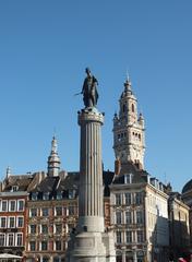 Column of the Goddess in the Grand Place of Lille with Chamber of Commerce towers in background