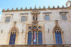 Sponza Palace in Dubrovnik, Croatia with a clear blue sky