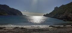 Sormiou Beach with turquoise waters surrounded by rocky cliffs