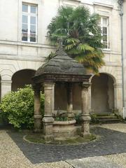 Old Couvent des Récollets well in Cognac, Charente, France