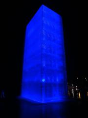 Blue Glowing Tower at night with illuminated blue lights