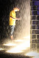 Boy playing in Crown Fountain, Chicago