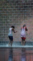 Visitors enjoying the Crown Fountain in Chicago's Millennium Park