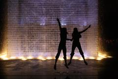 Crown Fountain in Chicago USA with people interacting with the water feature