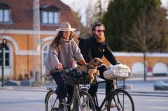 Cyclists and a dog at Frederiksberg park, Copenhagen