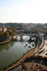 The Tiber River, Vittorio Emanuele II Bridge, and Janiculum Hill seen from the Castel Sant'Angelo platform in Rome, Italy