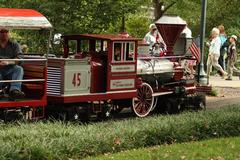 St Louis Zoo Railroad train passing through a lush green landscape