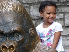 Girl on Gorilla Sculpture at St. Louis Zoo in Missouri