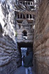 A narrow passage through artificial rocks at Nek Chand's Rock Garden