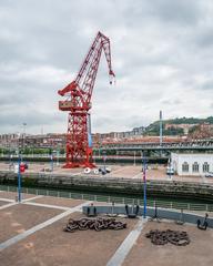 Port crane 'Carola' in front of the Naval Museum in Bilbao, Spain