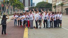 Excursion posing for photo at Merdeka Square Kuala Lumpur