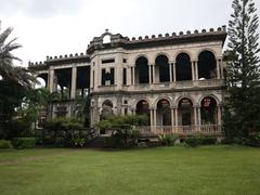 The Ruins mansion under a cloudy sky in Talisay City, Negros Occidental