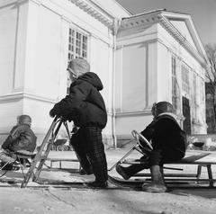 Children playing in Vanha Kirkkopuisto park, black and white photo