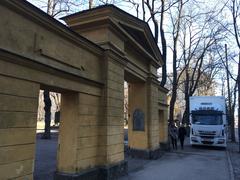 Ornamental gate with a truck on the sidewalk in Helsinki, 2018