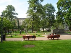 Helsinki Ruttopuisto during summer with lush greenery and clear skies