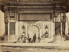 1867 photograph of Ahmed III Fountain in Istanbul with local figures and a central figure in western attire