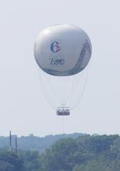 Channel 6 Zooballoon flying over Philadelphia Zoo with passengers