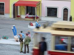 Miniature model scene of a train station at Kolejkowo in Wrocław