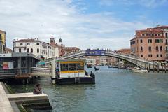 Vaporetto stop Ferrovia on Canal Grande in Venice with Ponte degli Scalzi in the background