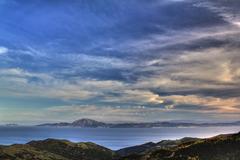 view of the African shore of the Strait of Gibraltar from Spain during sunset