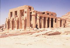 Ancient Egyptian temple ruins with large statues and columns at Ramesseum