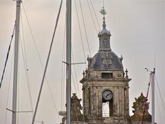 masts and detail of Grosse Horloge in La Rochelle