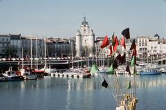 Fishing trawler in the Port of La Rochelle with fishing gear markers in the foreground