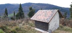 Arnotegi mountain summit mailbox with Pagasarri in the background