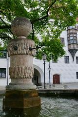 Fountain in the Old Court with view of the Gothic oriel in the south wing