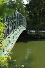 Scenic view of Jardin Public park in Bordeaux with green trees and a serene pond