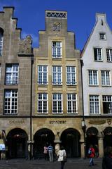 Principalmakt in Münster with historic buildings and busy square