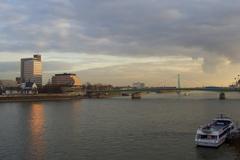 evening Rhine panorama in Cologne with Deutz Bridge and Lanxess administration building