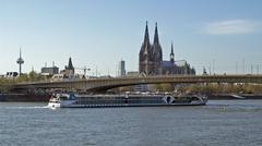 River cruise ship Alina by Scylla Tours sailing under the Deutz Bridge in Cologne