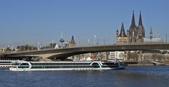 Amadeus Diamond river cruise ship under the Deutz Bridge in Cologne