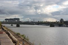 Cologne cityscape with the Rhine River in the foreground