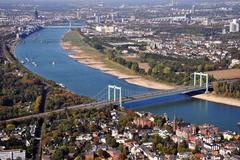 Cologne low water level autumn 2018 with Rodenkirchen motorway bridge in the foreground