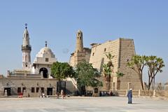 Abu el-Haggag Mosque and pylon of Luxor Temple in Luxor, Egypt