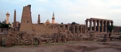 Panoramic view of Luksor with lush landscape and one of the Great Pyramids in the background