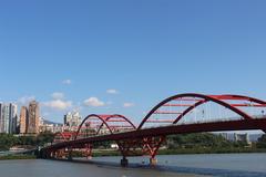 Guandu Bridge under blue sky with clouds