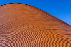 The Wooden Church in Helsinki under a blue sky