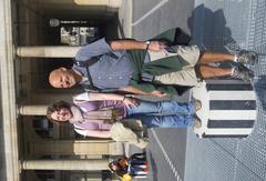 Margaret and Marc Vincent standing among the Colonnes de Buren in Paris