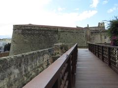 Camí de ronda de la muralla d'Otranto over Porta a Mare with Otranto Castle in the background, Italy