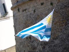 Flag of Uruguay at the entrance of Otranto castle, Province of Lecce, Apulia, Italy