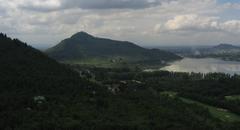 View of Dal Lake in Srinagar with houseboats and mountains