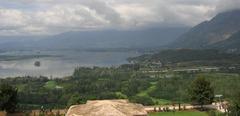 Dal Lake in Srinagar with beautiful mountain views and houseboats