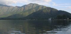 Scenic view of Dal Lake in Srinagar with mountains in the background