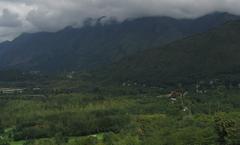 Scenic view of Dal Lake with mountains in the background