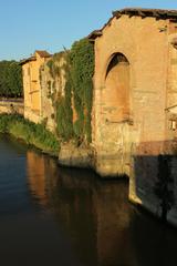 Lungarno in Pisa with picturesque buildings along the river